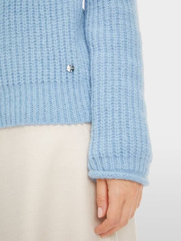 Marc Cain Sweater mit Zopf - Knitted in Germany Angebote