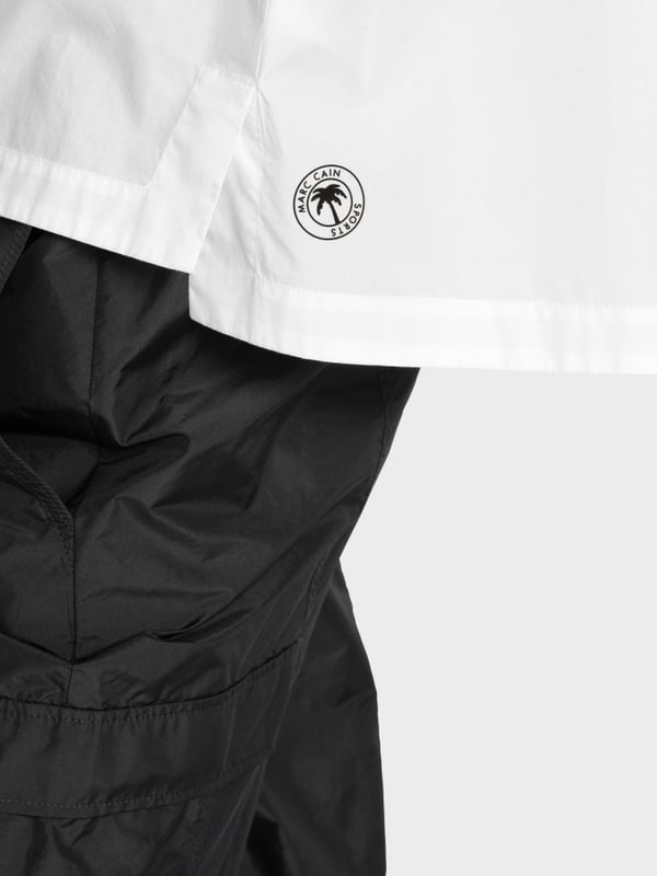 Marc Cain Ärmellose Hemdbluse "Rethink Together" Speichern exportieren