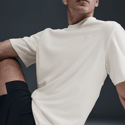 Nike PrimaryVielseitiges Nike Dri-FIT Kurzarm-Oberteil für Herren Kostenloser Versand