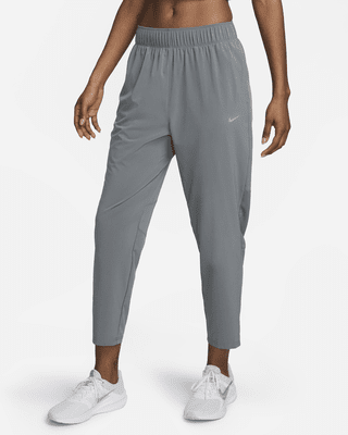 Nike Dri-FIT Fast7/8-Laufhose mit mittelhohem Bund für Damen